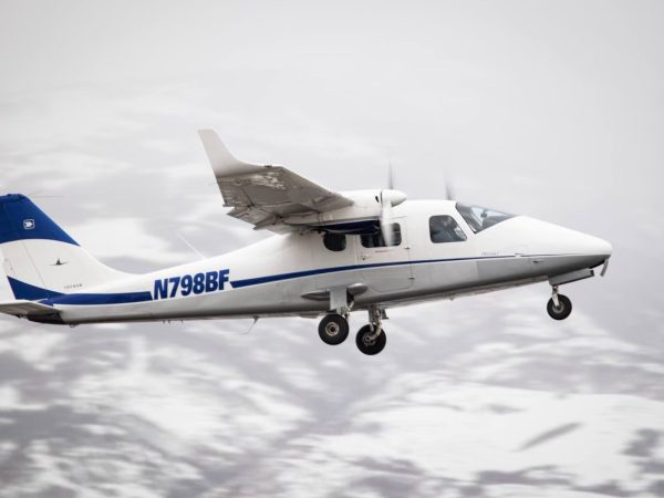 Instructor providing post-flight evaluation and performance improvement recommendations