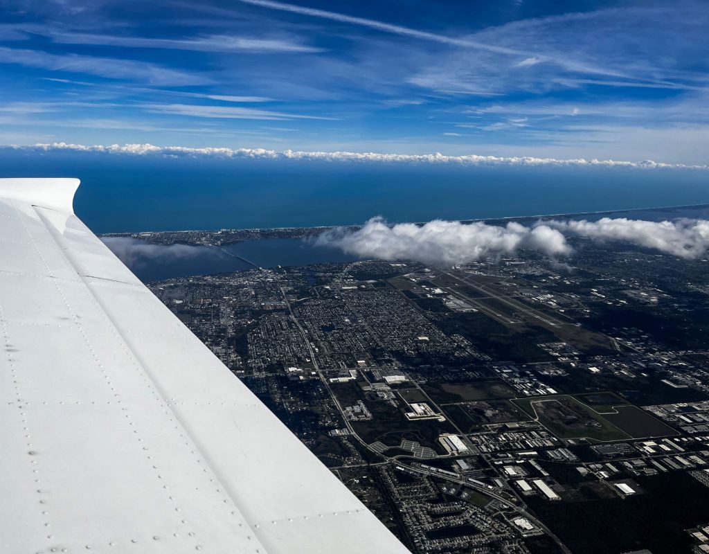 Student pilot performing preflight inspection at Pembroke Pines Dynasty Aviation