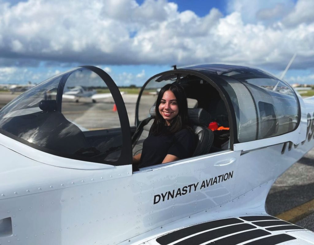 aviation students practicing preflight checks with Dynasty Aviation Inc instructors