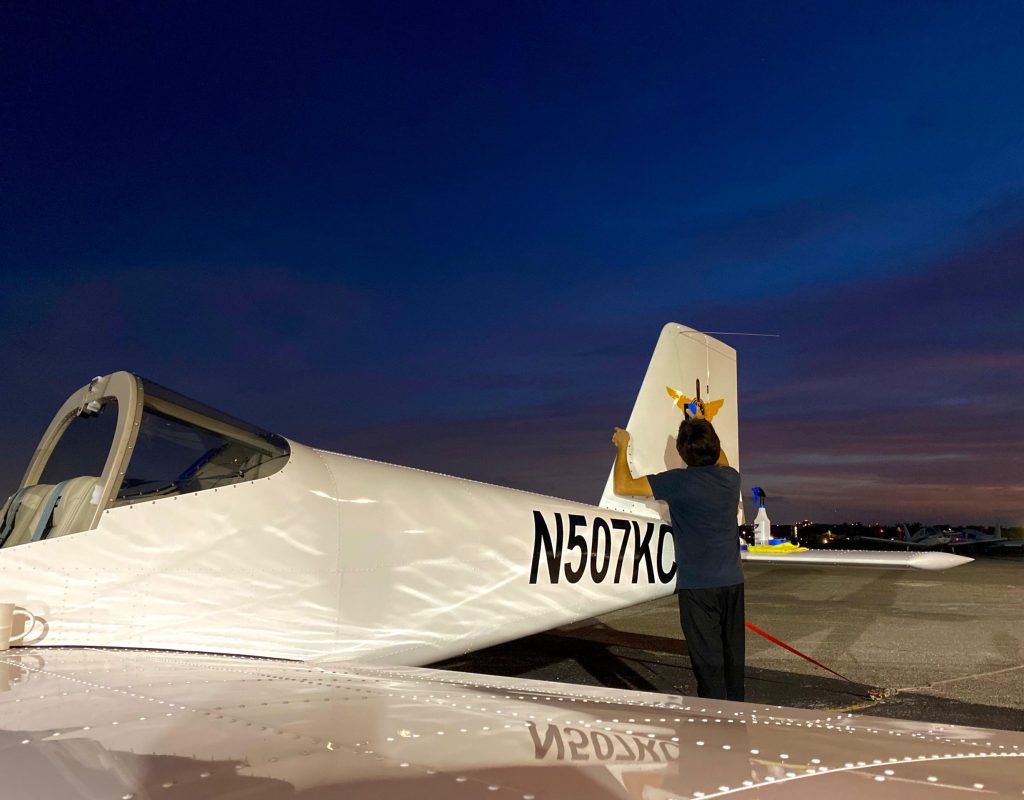 Flight student mastering communication skills using aviation radio equipment