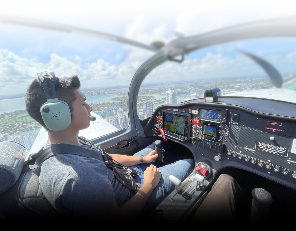 flight instructor mentoring aviation student at Dynasty Aviation Inc training site